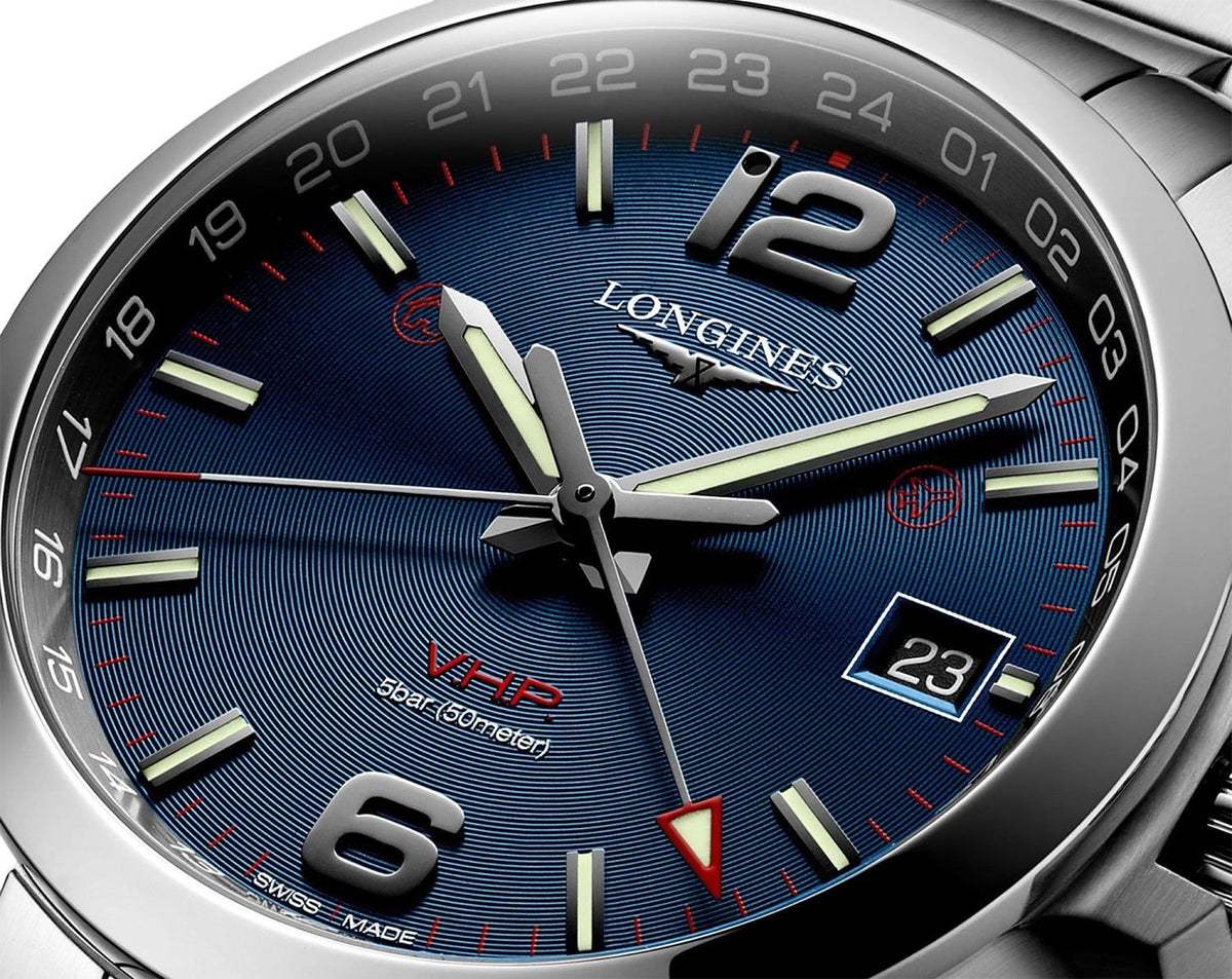 Longines Conquest V.H.P. GMT Stainless Steel Blue Dial Perpetual Calendar Date Quartz Mens Watch L3.728.4.96.6