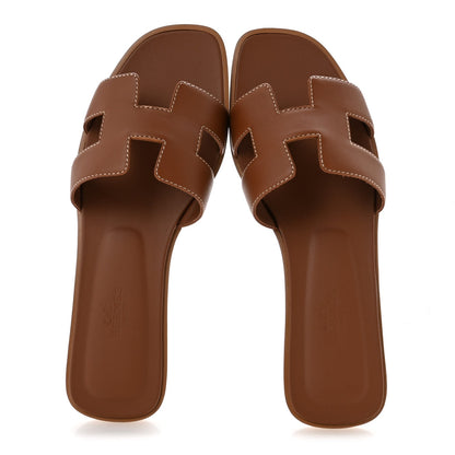 Box Calfskin Oran Sandals 37.5 Gold