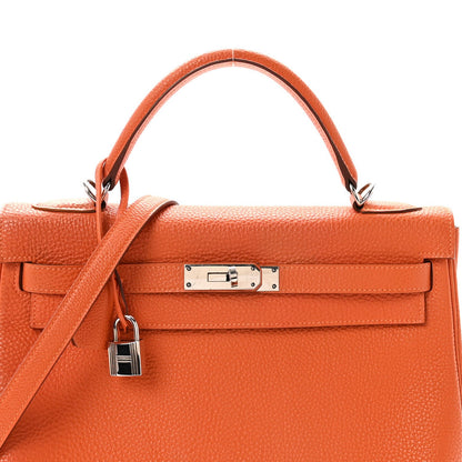 Togo Kelly Retourne 32 Orange