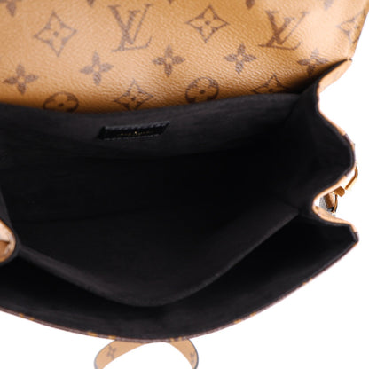 Reverse Monogram Pochette Metis