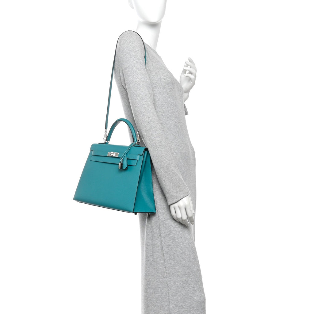 Epsom Kelly Sellier 32 Bleu Paon