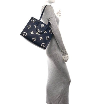 Empreinte Monogram Giant Onthego MM Navy Creme