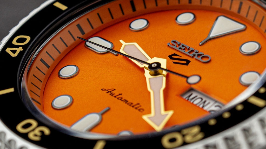 Seiko 5 Sports Automatic Orange Dial Silver Steel Strap Watch For Men - SRPD59K1